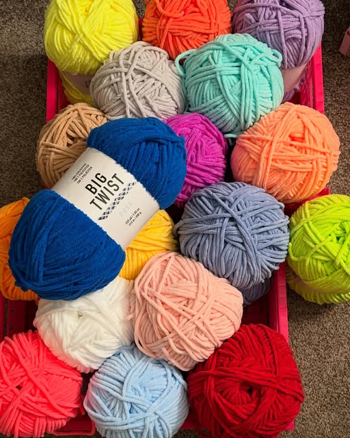 A collection of colourful yarn balls